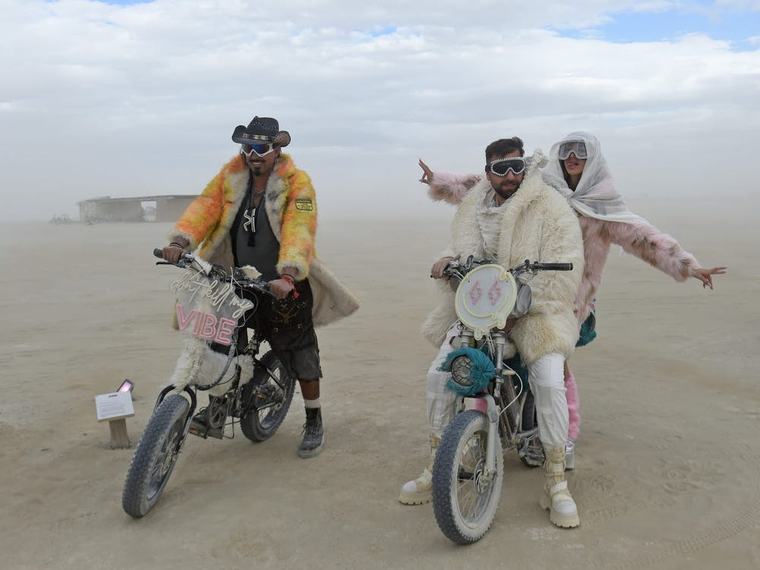 19 surreal photos show the mud, chaos, and glamour of Burning Man